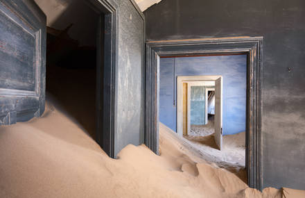 Uninhabited Houses Buried Under Sand