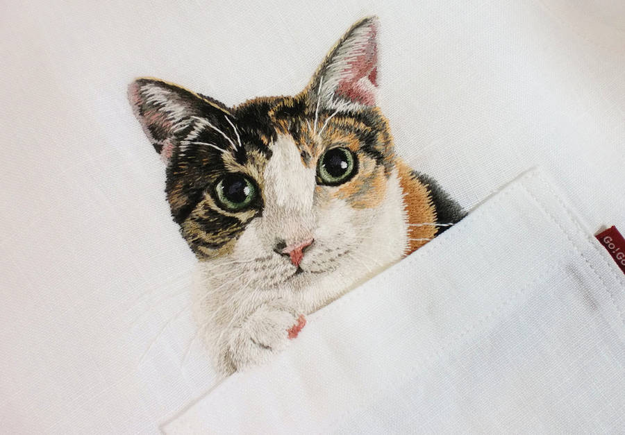 hiroko kubota embroiders cats onto shirt pockets • craft • frankie