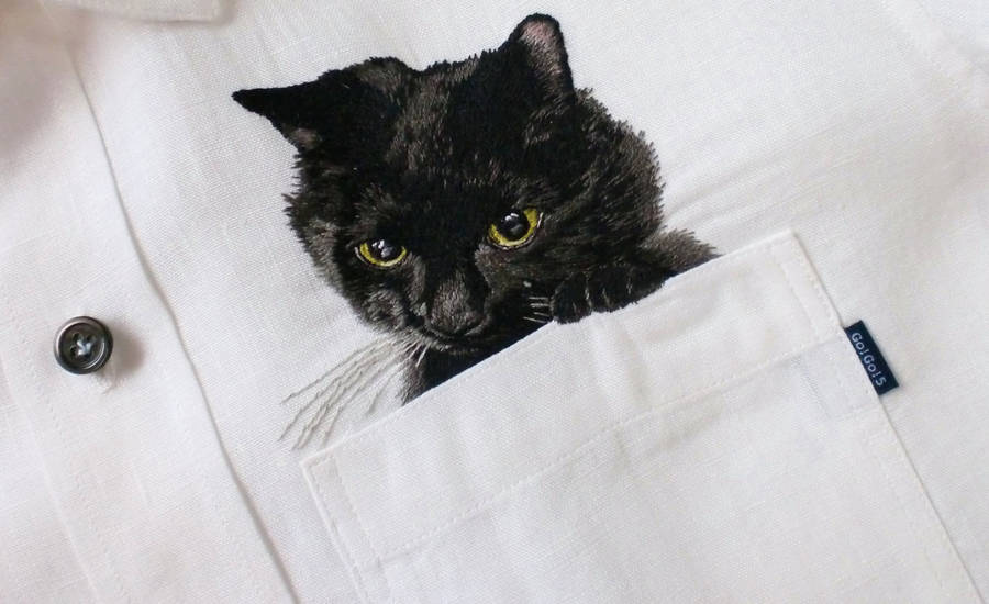 hiroko kubota embroiders cats onto shirt pockets • craft • frankie